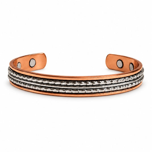 A copper magnetic cuff bracelet with three horizontal rows of silver beaded accents, featuring circular magnetic inserts on the inner ends, shown on a plain white background.